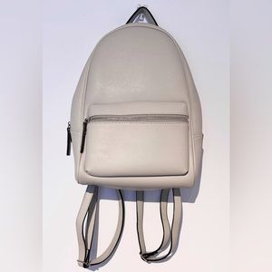 21. Little Burgundy backpack purse (light grey)